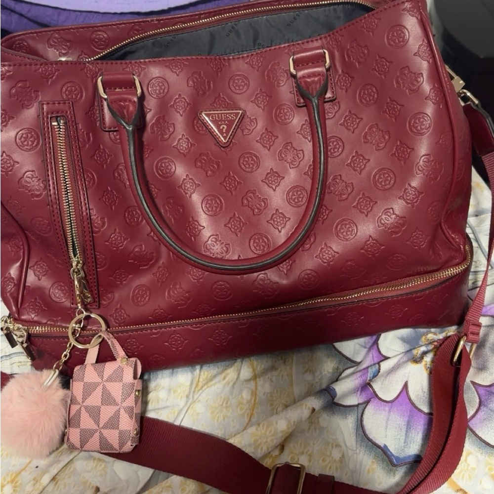 Red Travel Bag with Glossy Finish and Structured Design